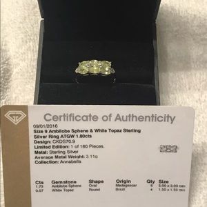 Genuine Ambilobe sphene and white topaz ring